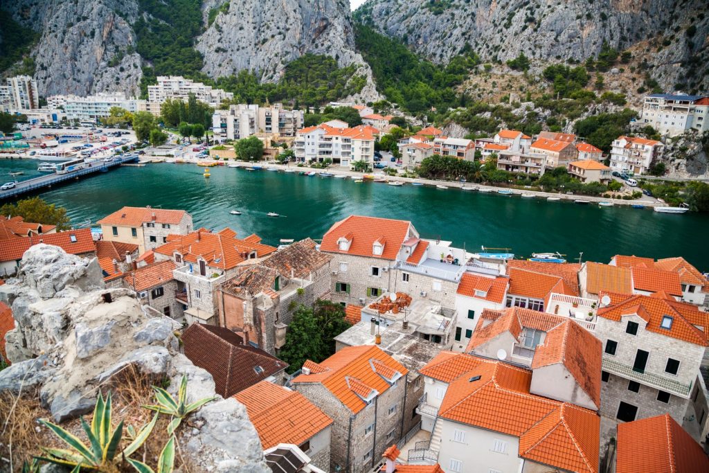 view from small houses river cetina town omis makarska riviera croatia Large